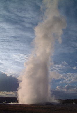 Old Faithful Geyser in the evening